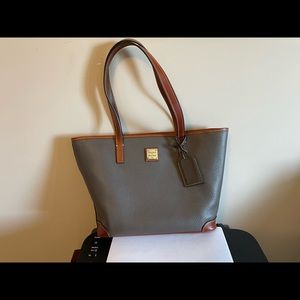 Dooney & Bourke work bag. Very professional and comes with dust bag.